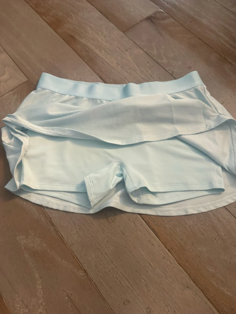 Nike Women’s Light Blue Tennis Skort with Black Swoosh
